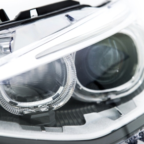 Design Scheinwerfer Schwarz + LED-Angel Eyes passt für BMW 1er F20, F21 ab 11-15